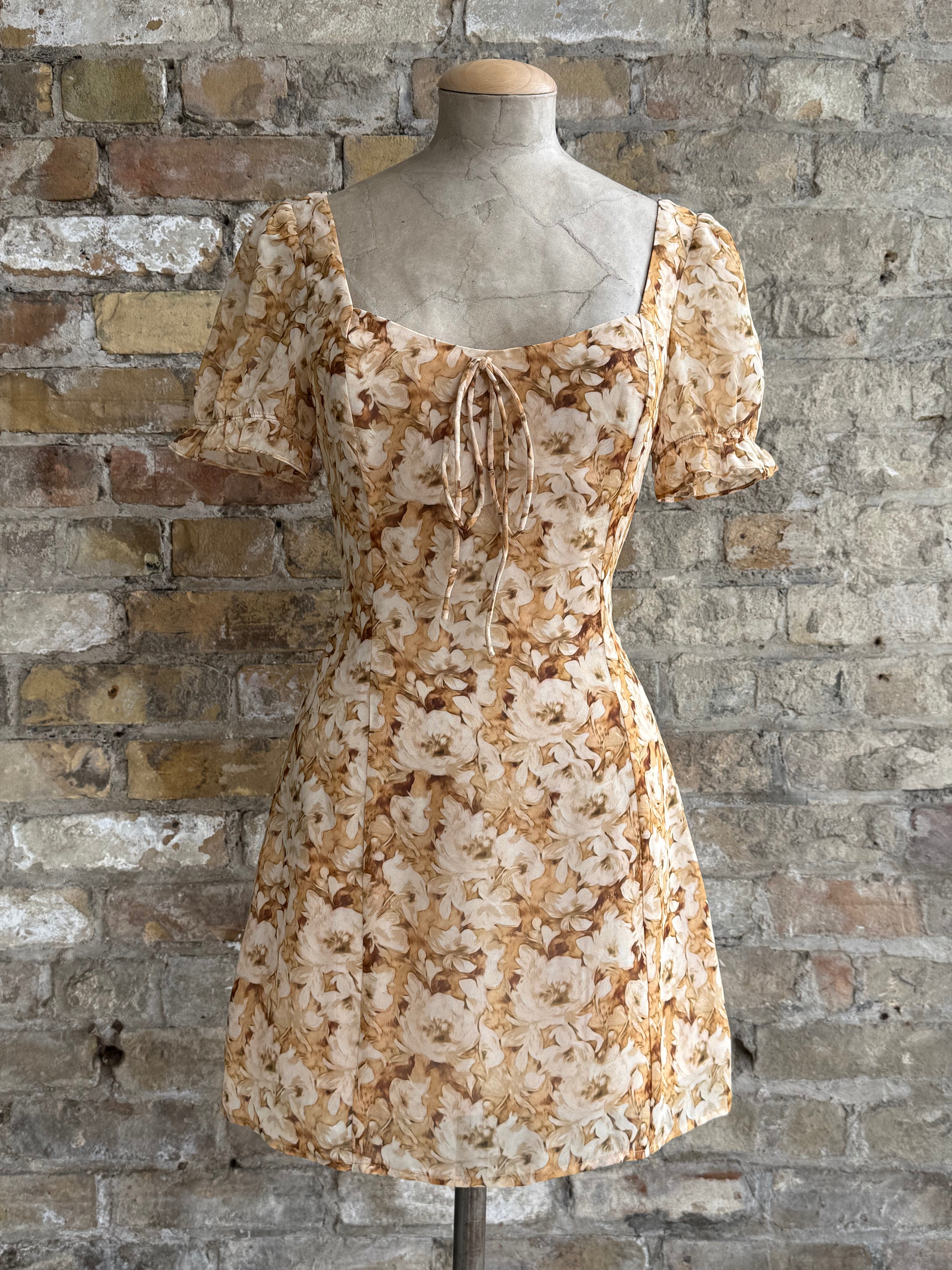 Dress with flowers in warm tones