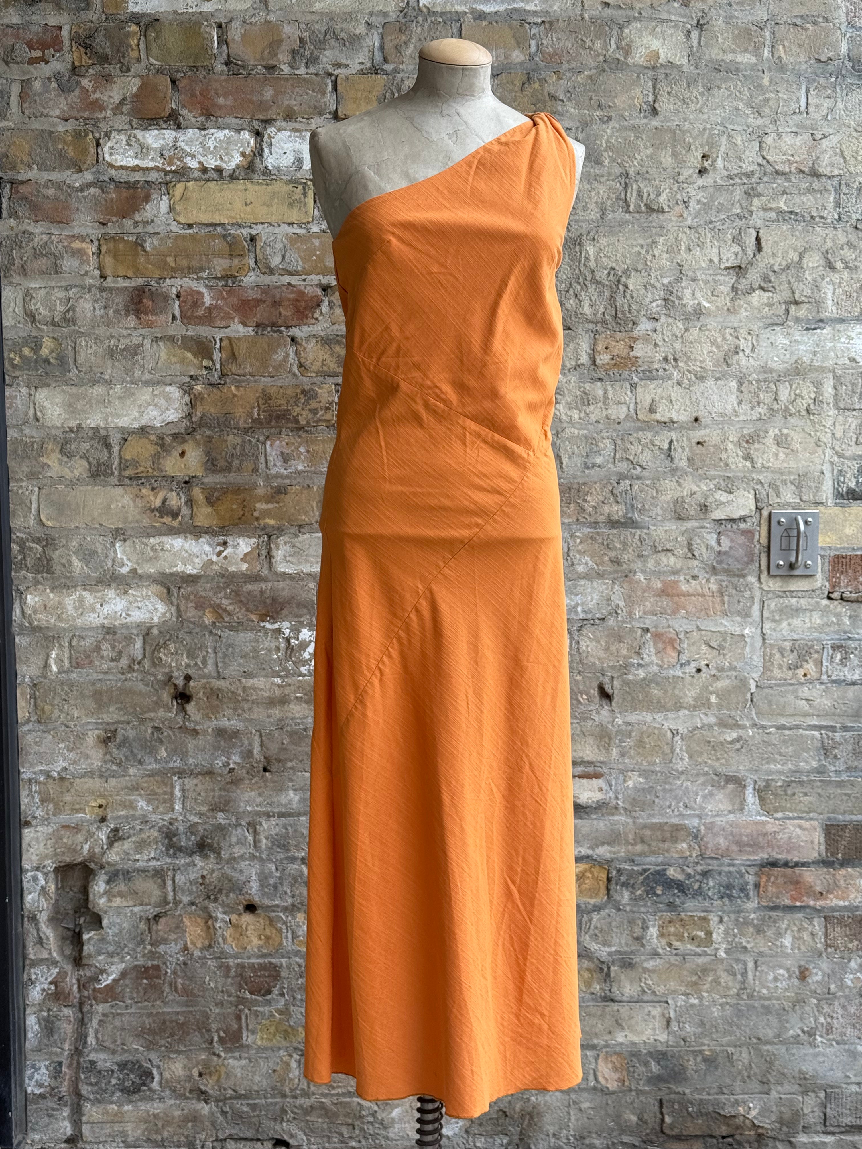 Long orange one-sleeved dress