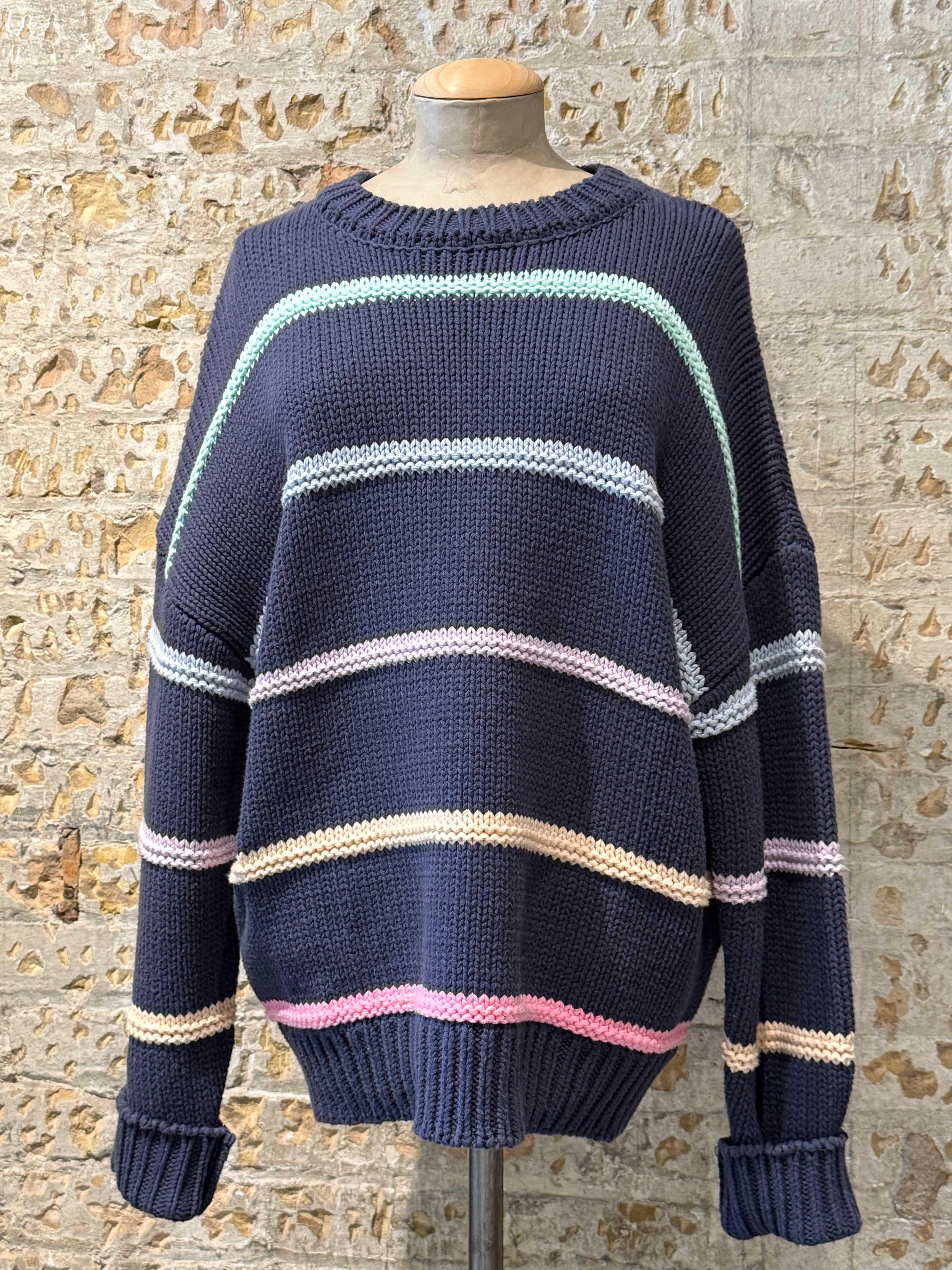 Colorful crochet sweater in horizontal lines