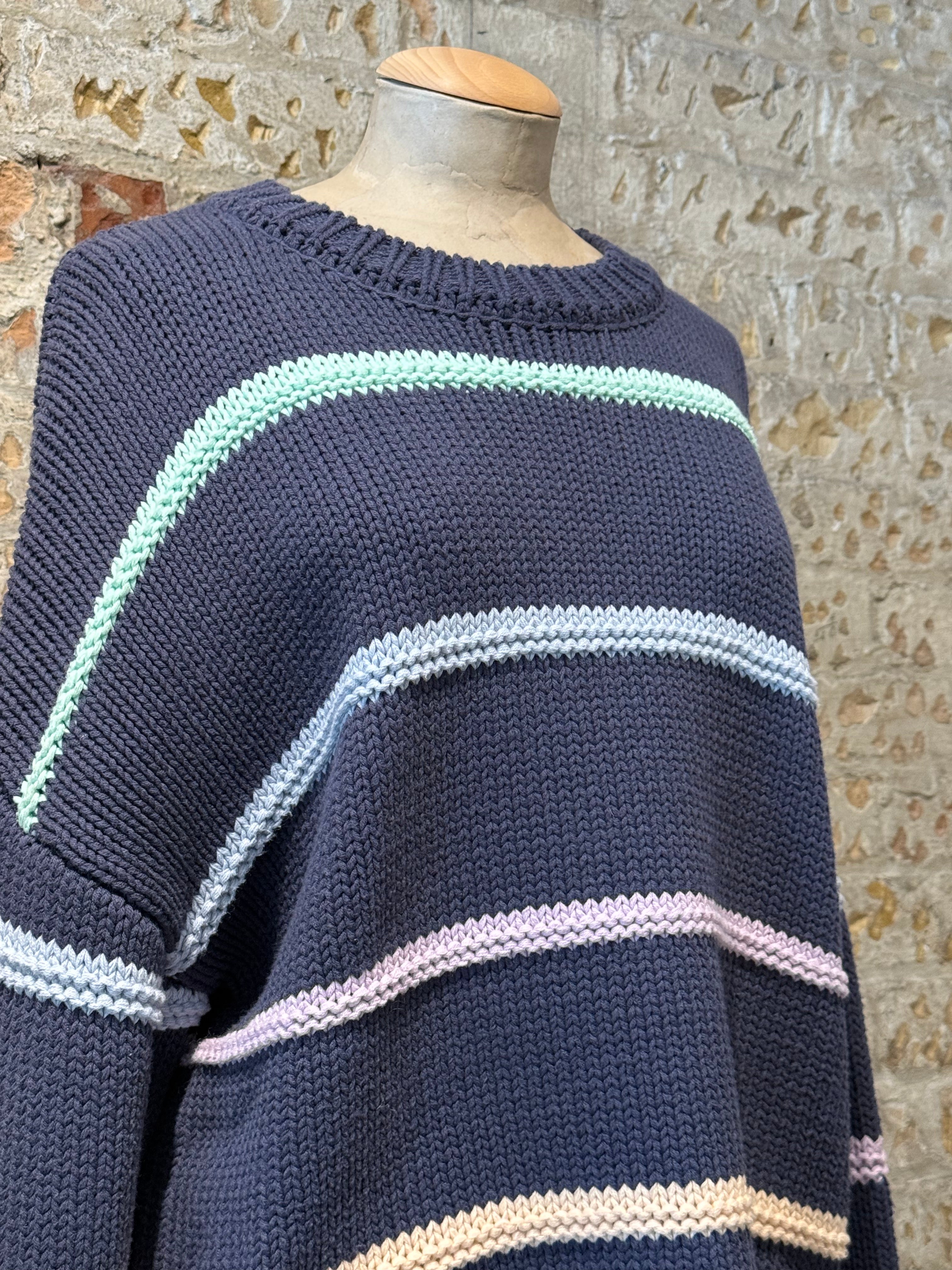 Colorful crochet sweater in horizontal lines