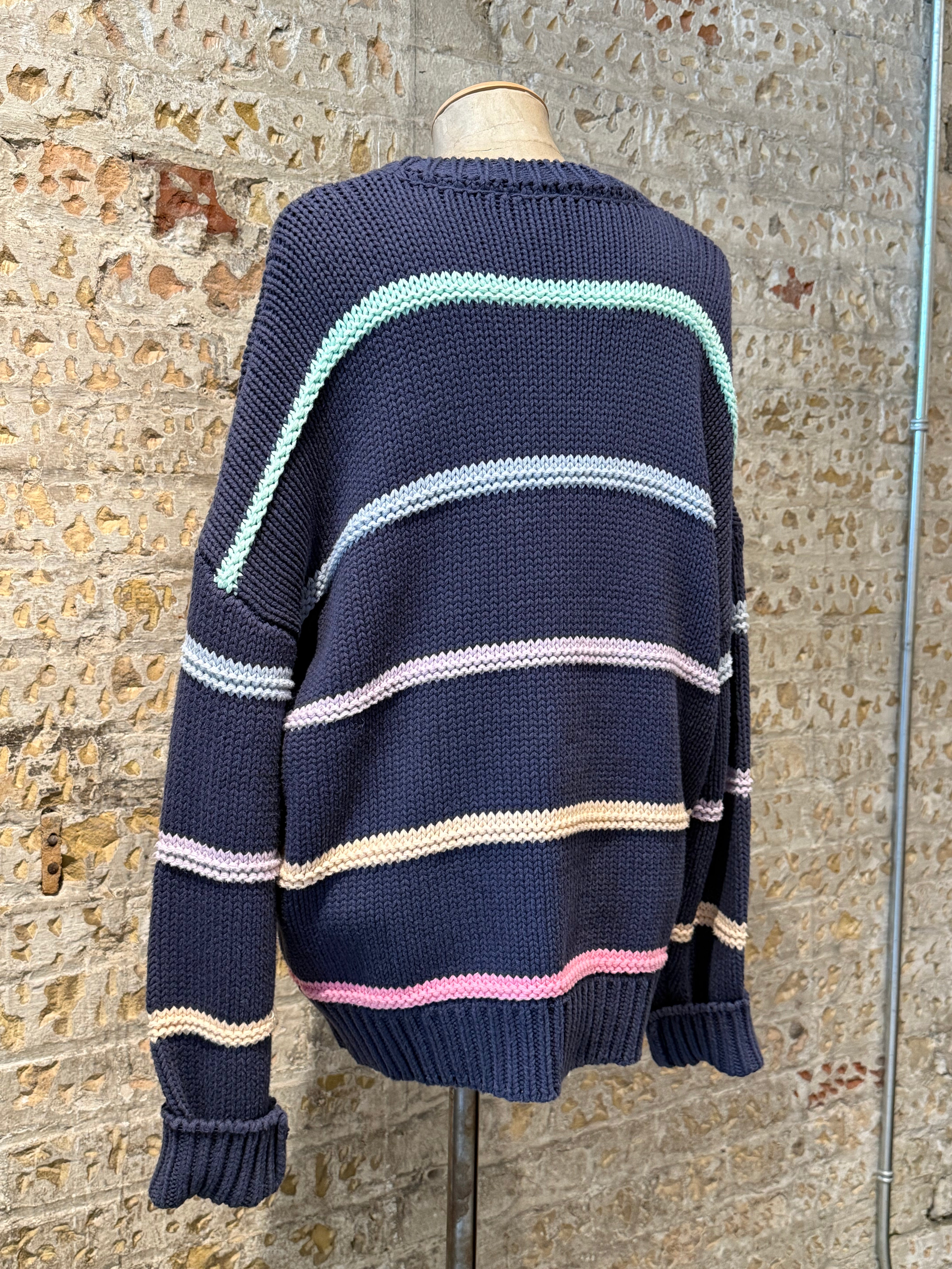 Colorful crochet sweater in horizontal lines