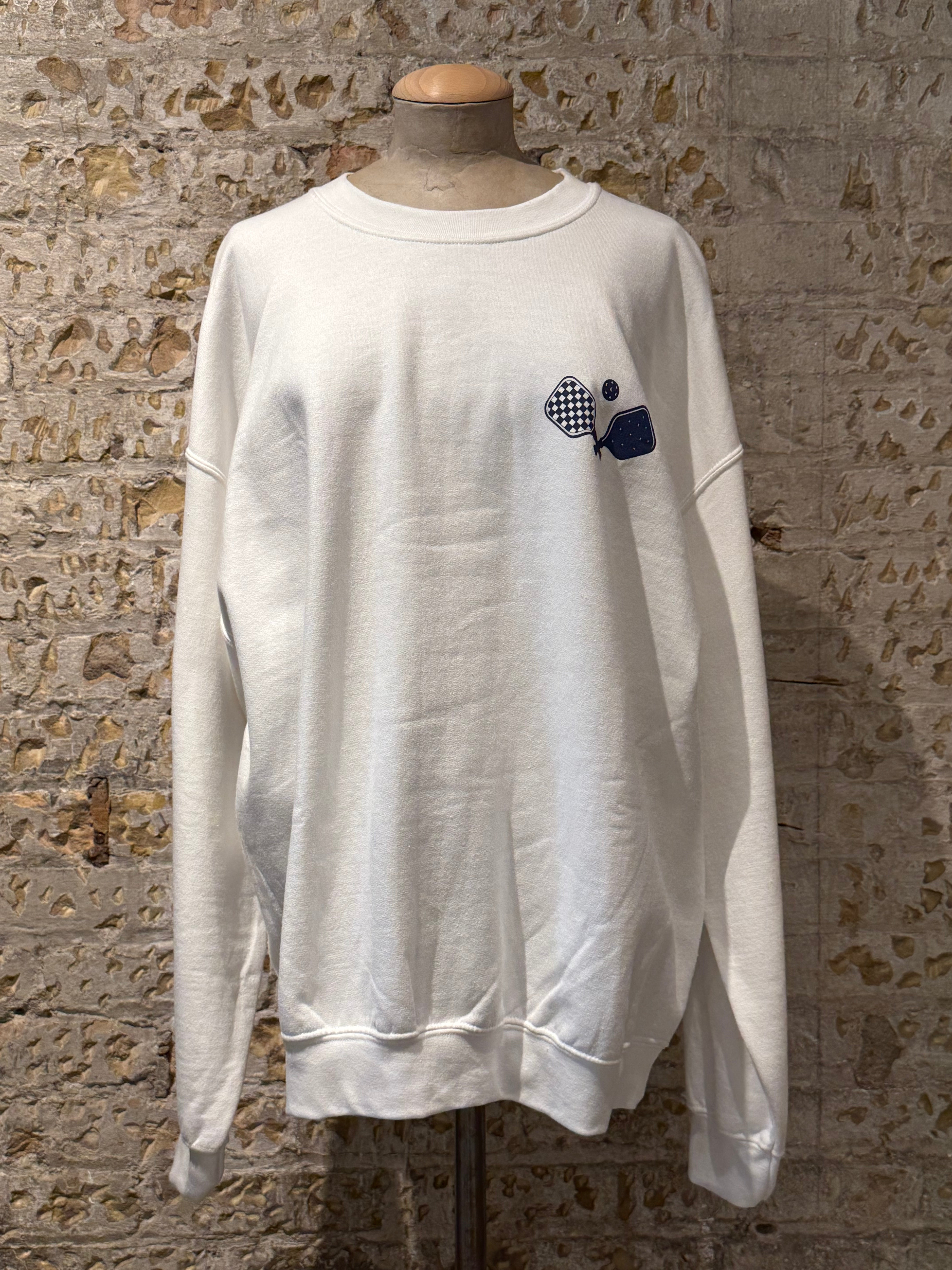 White paddle tennis sweater