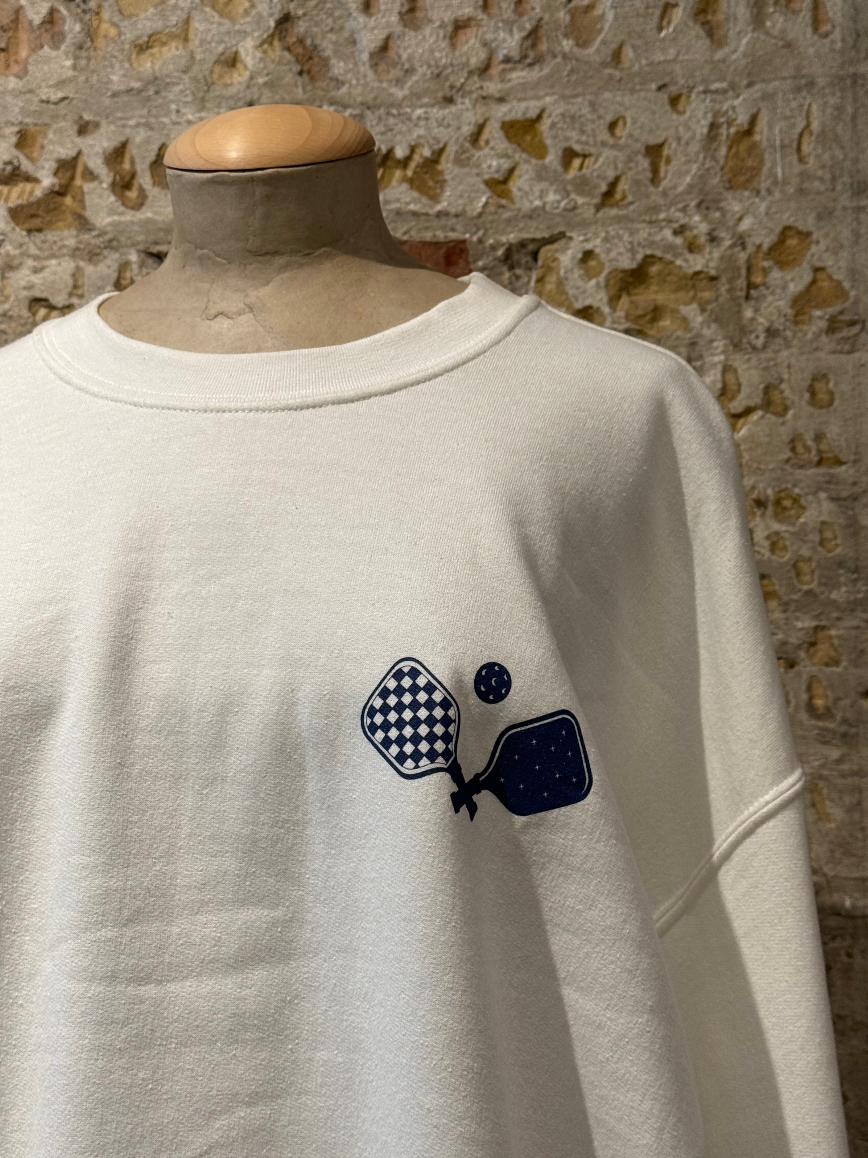 White paddle tennis sweater