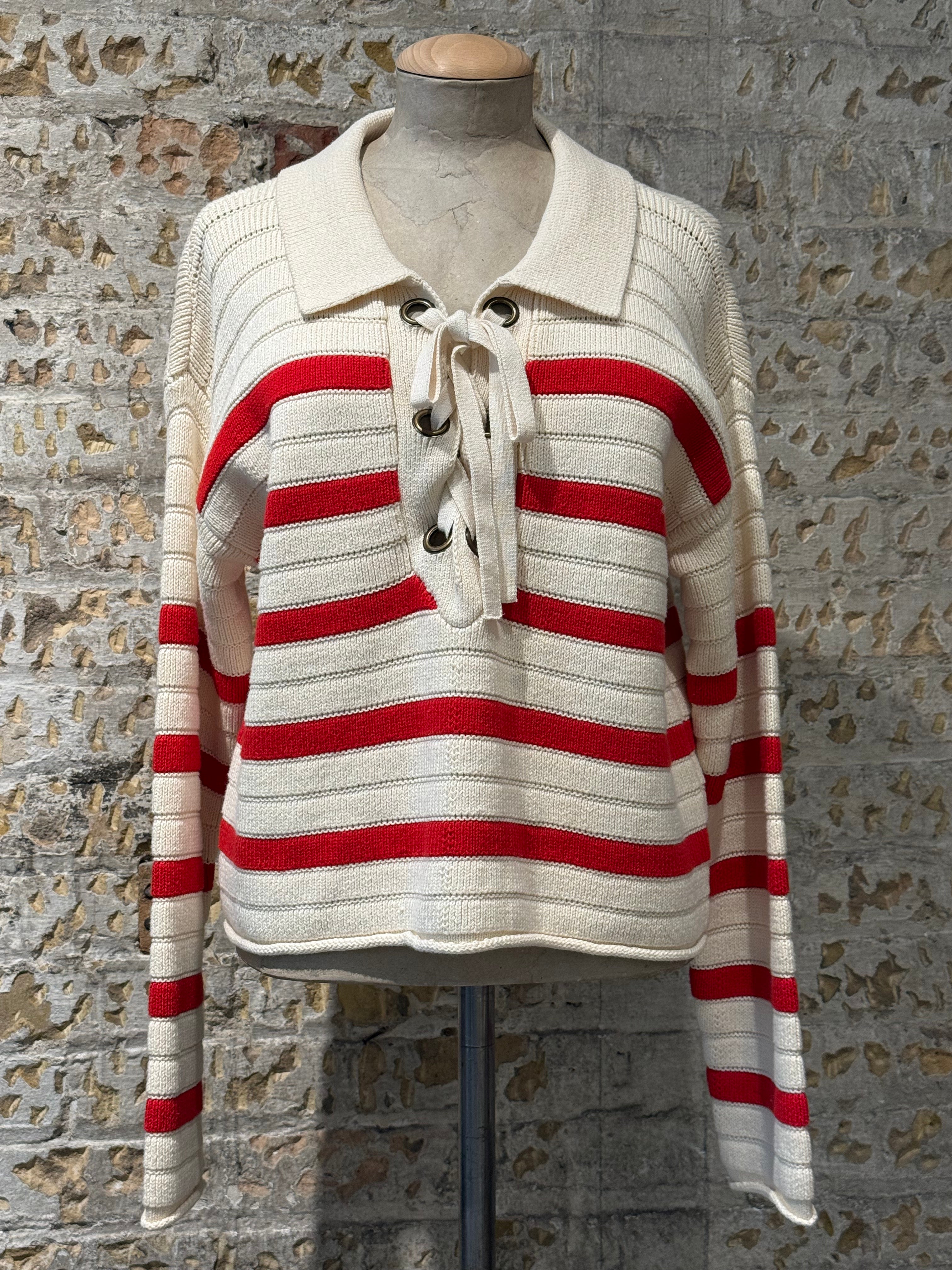 Beige sweater with horizontal red lines