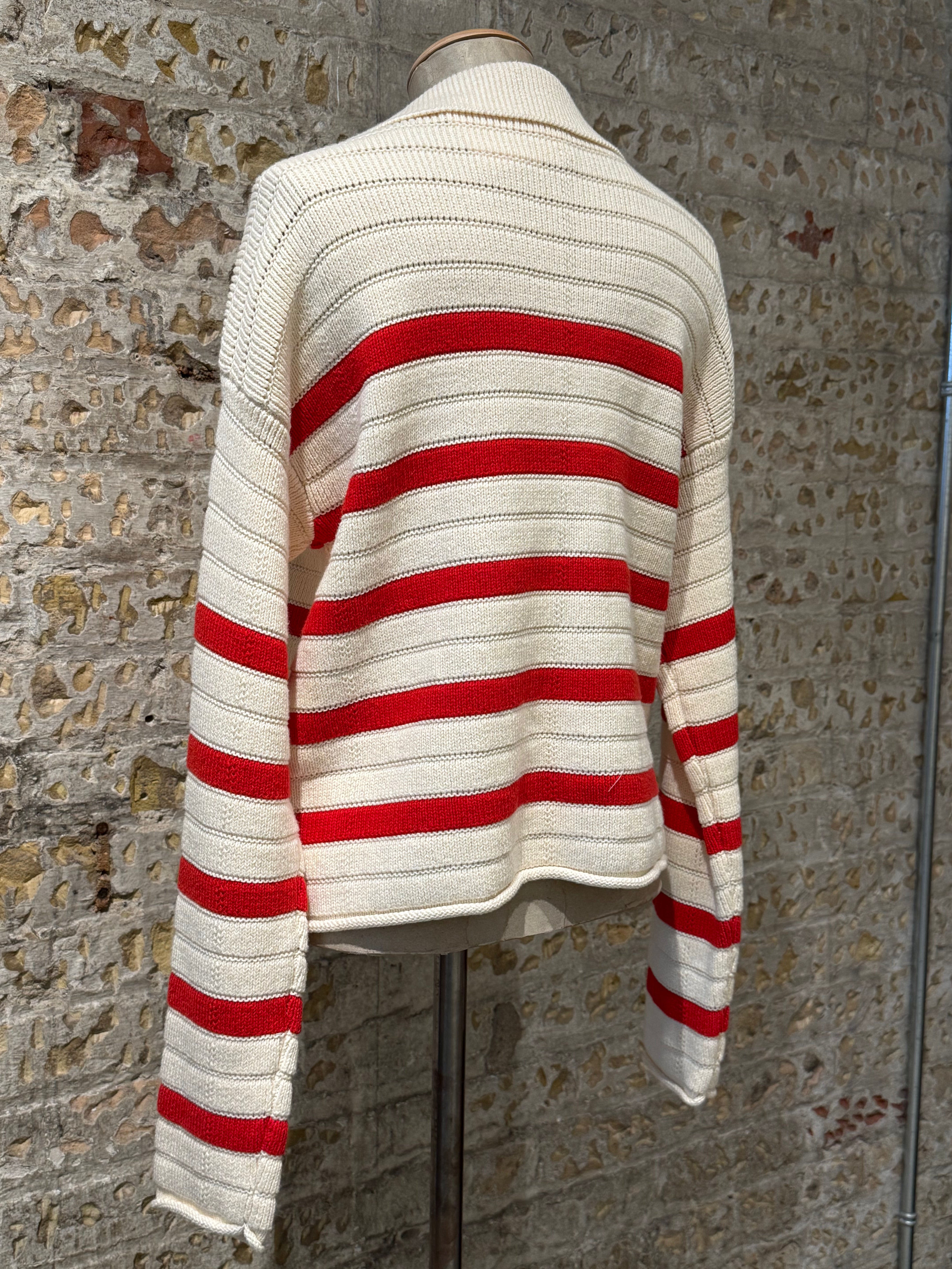 Beige sweater with horizontal red lines