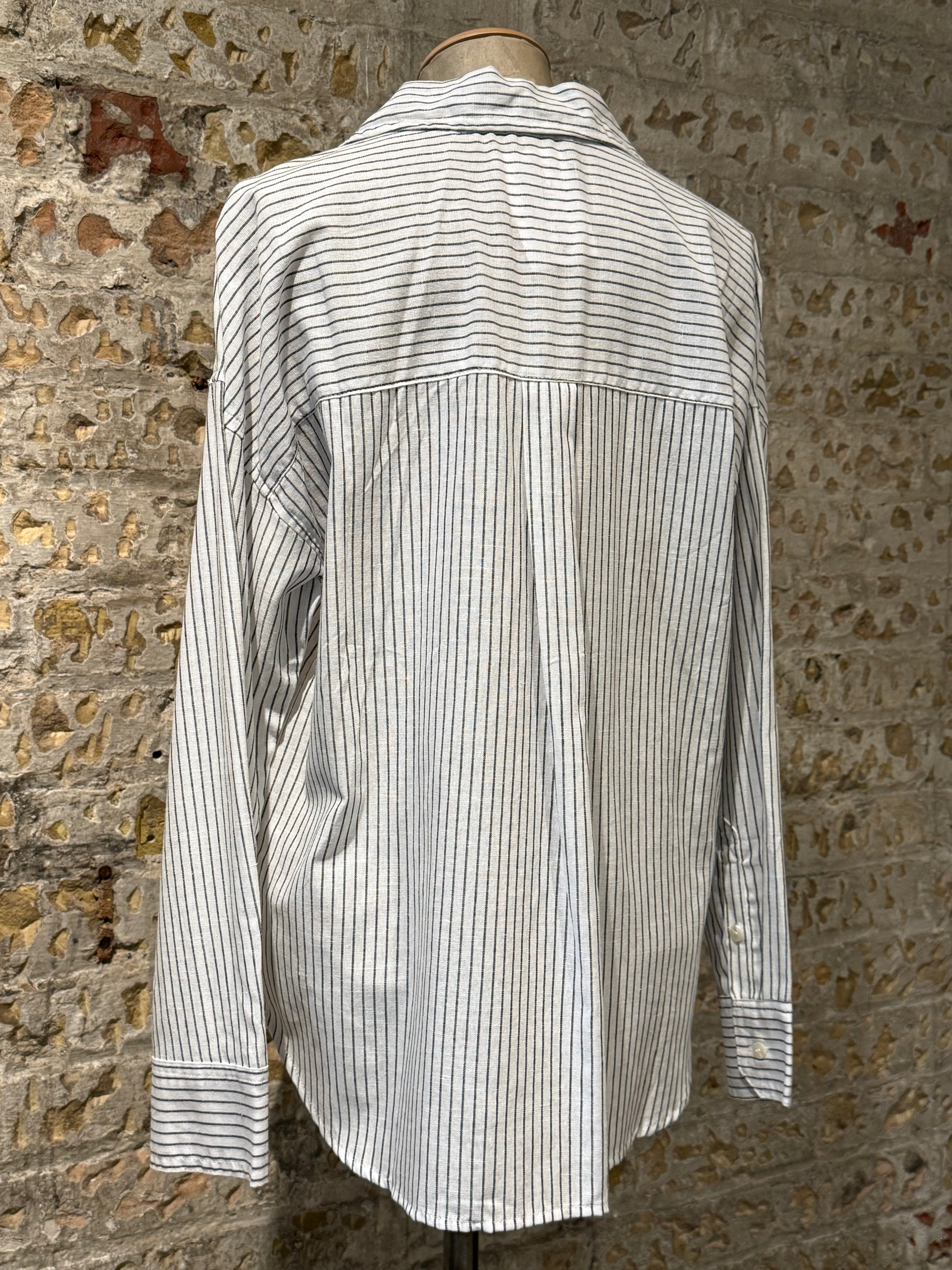 Long sleeve white shirt with buttons with black lines