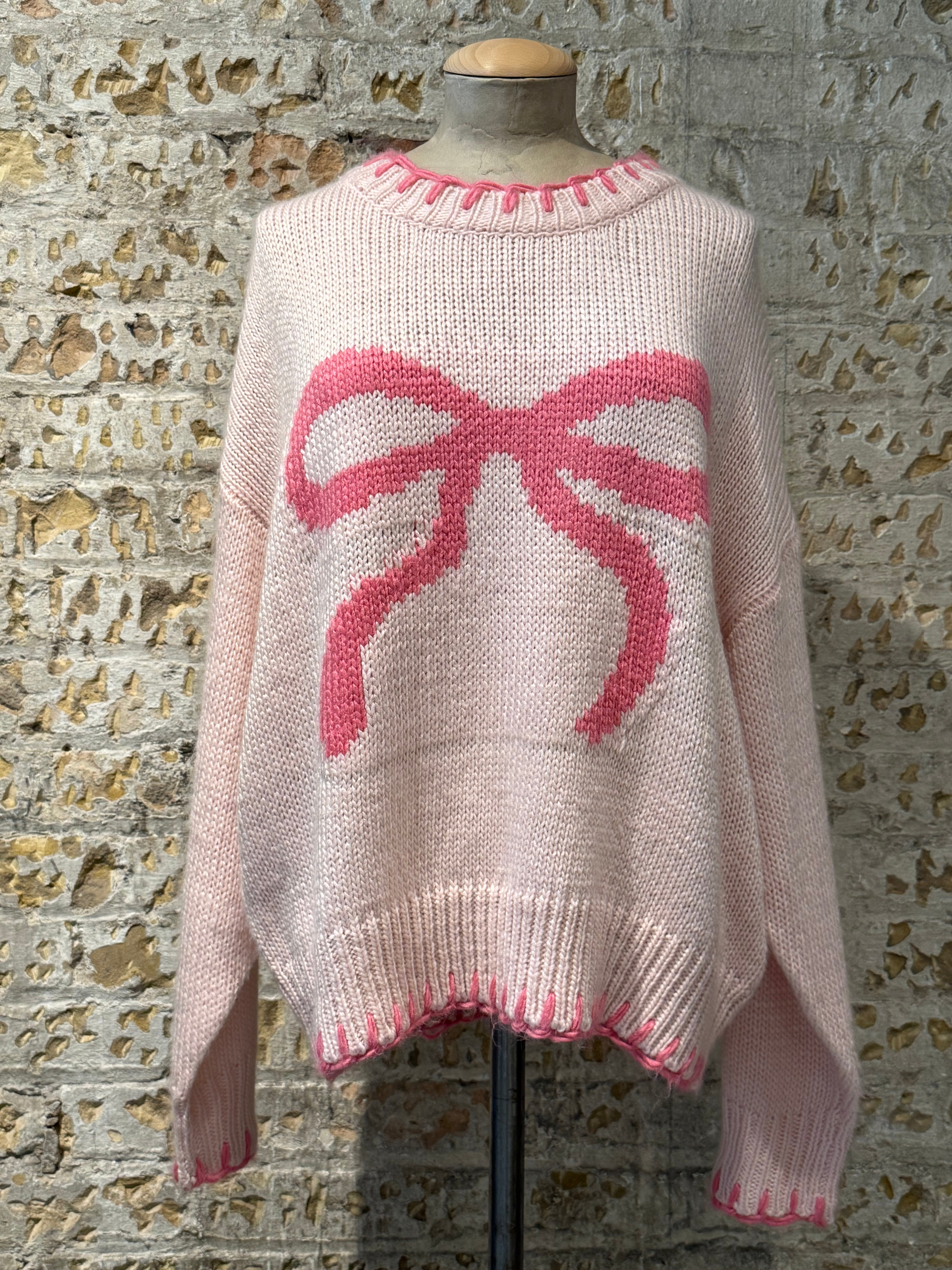 Pink crochet sweater, with bow print