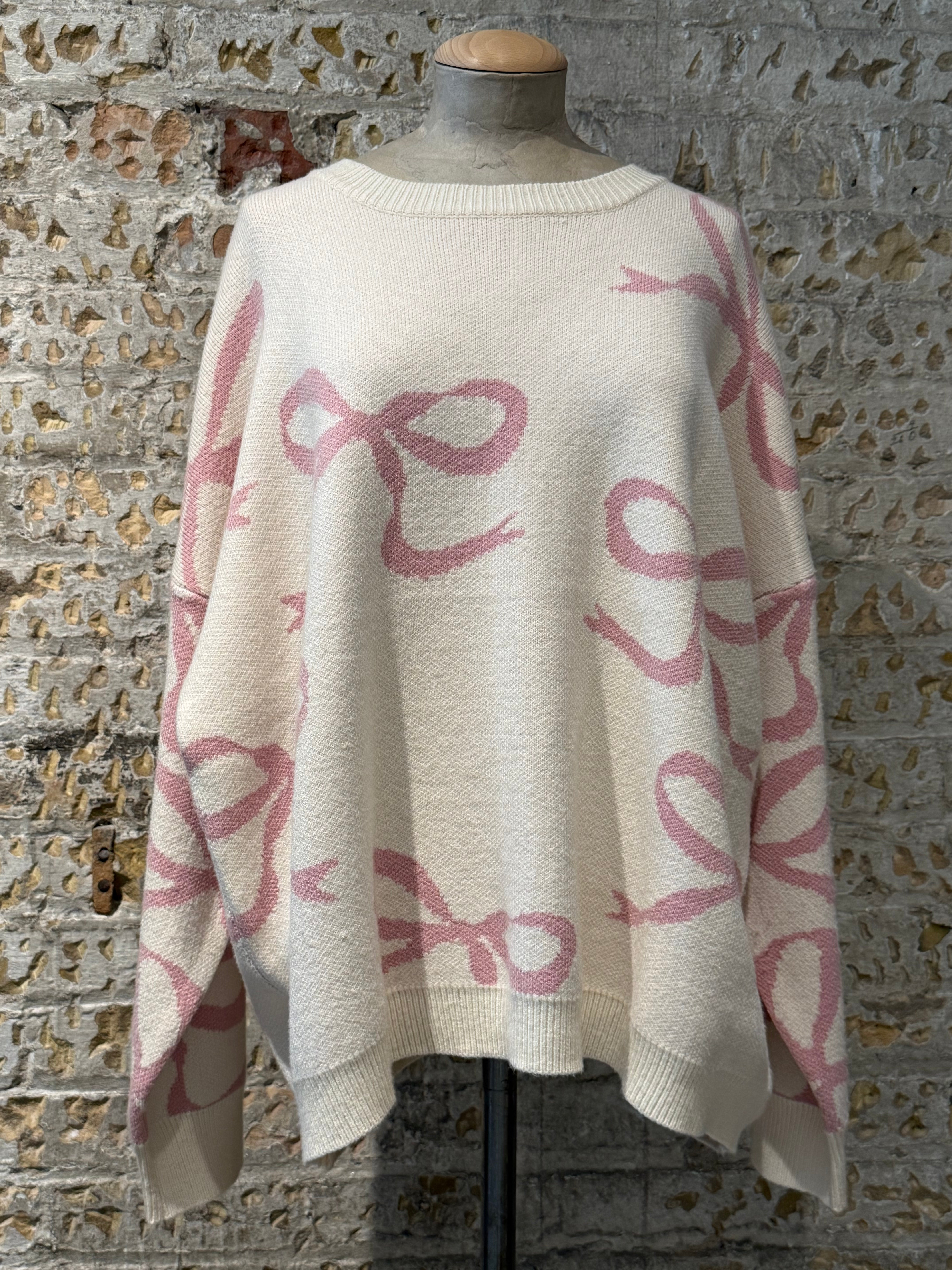 Sweater with pink bow prints