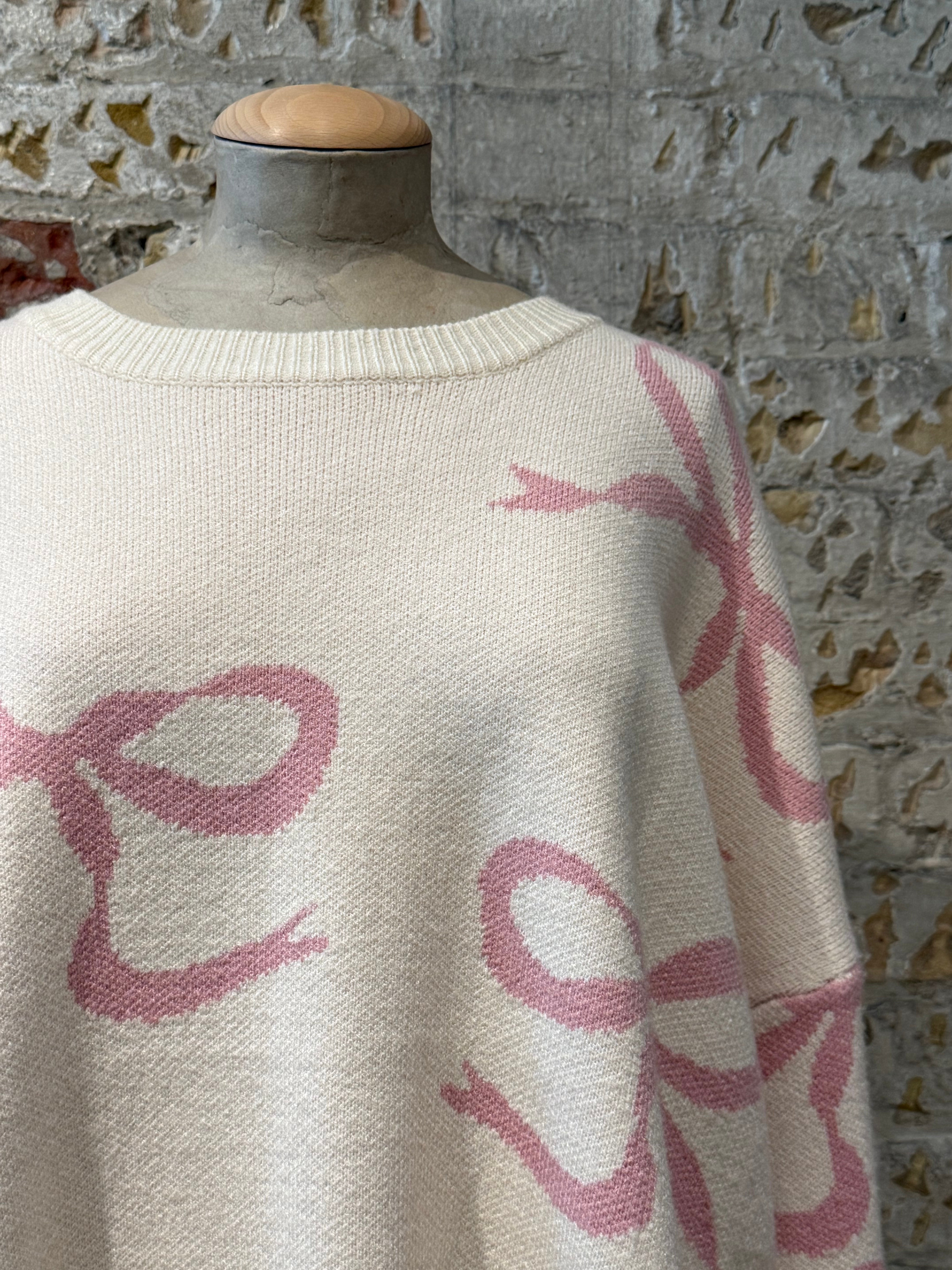 Sweater with pink bow prints