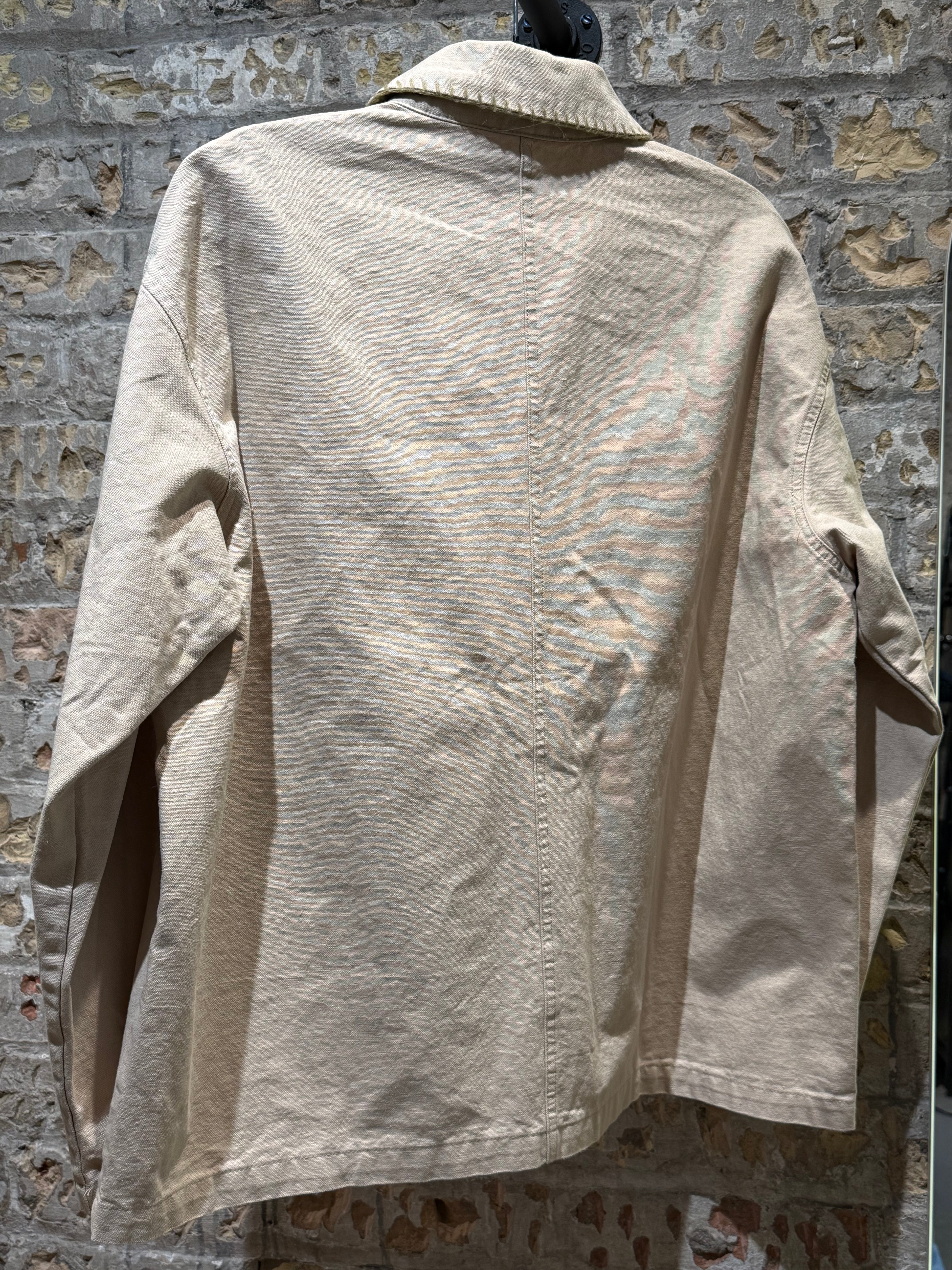 Sweater Cowboy beige with details in the Pockets