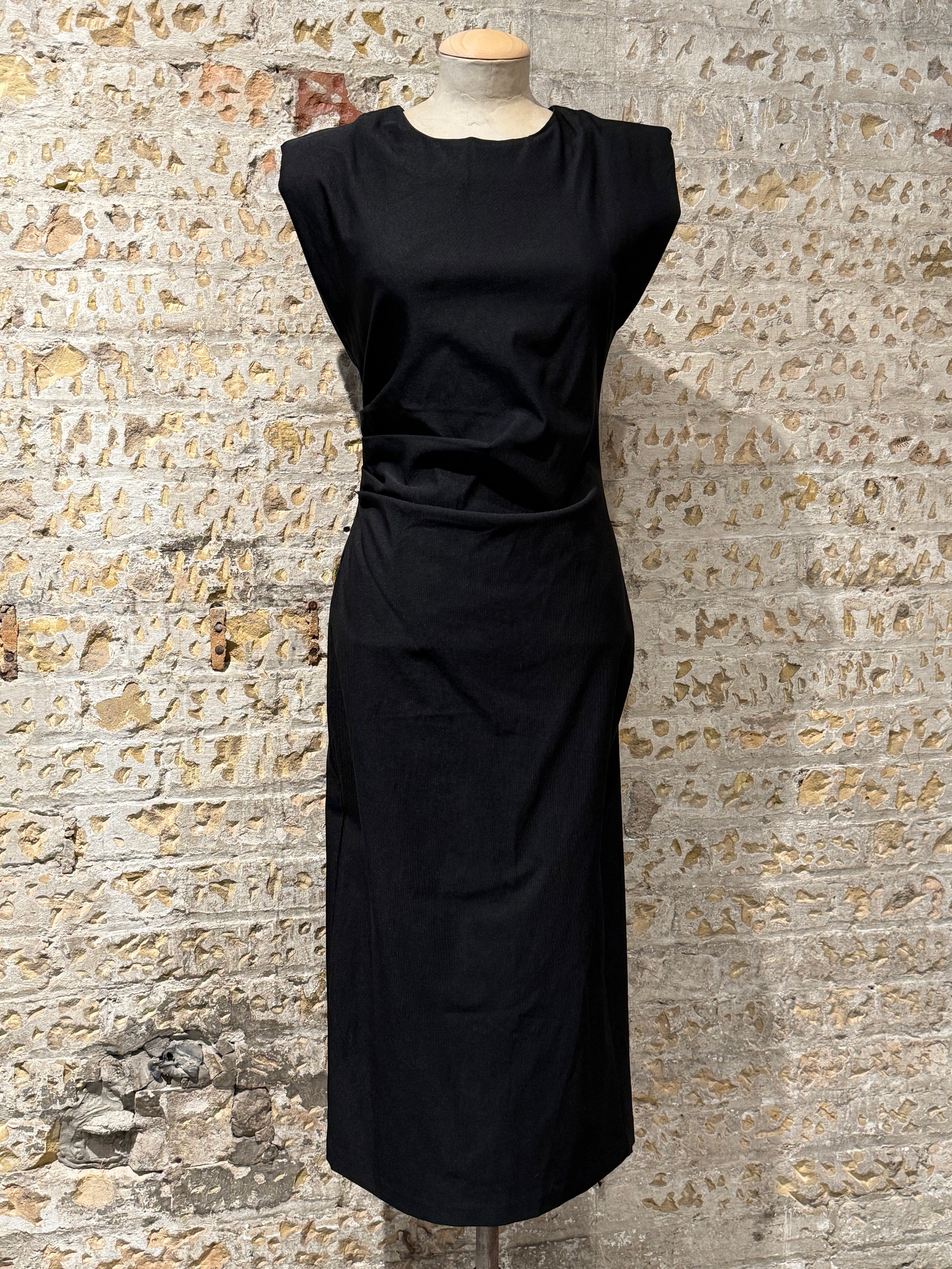 Black dress with shoulder pads