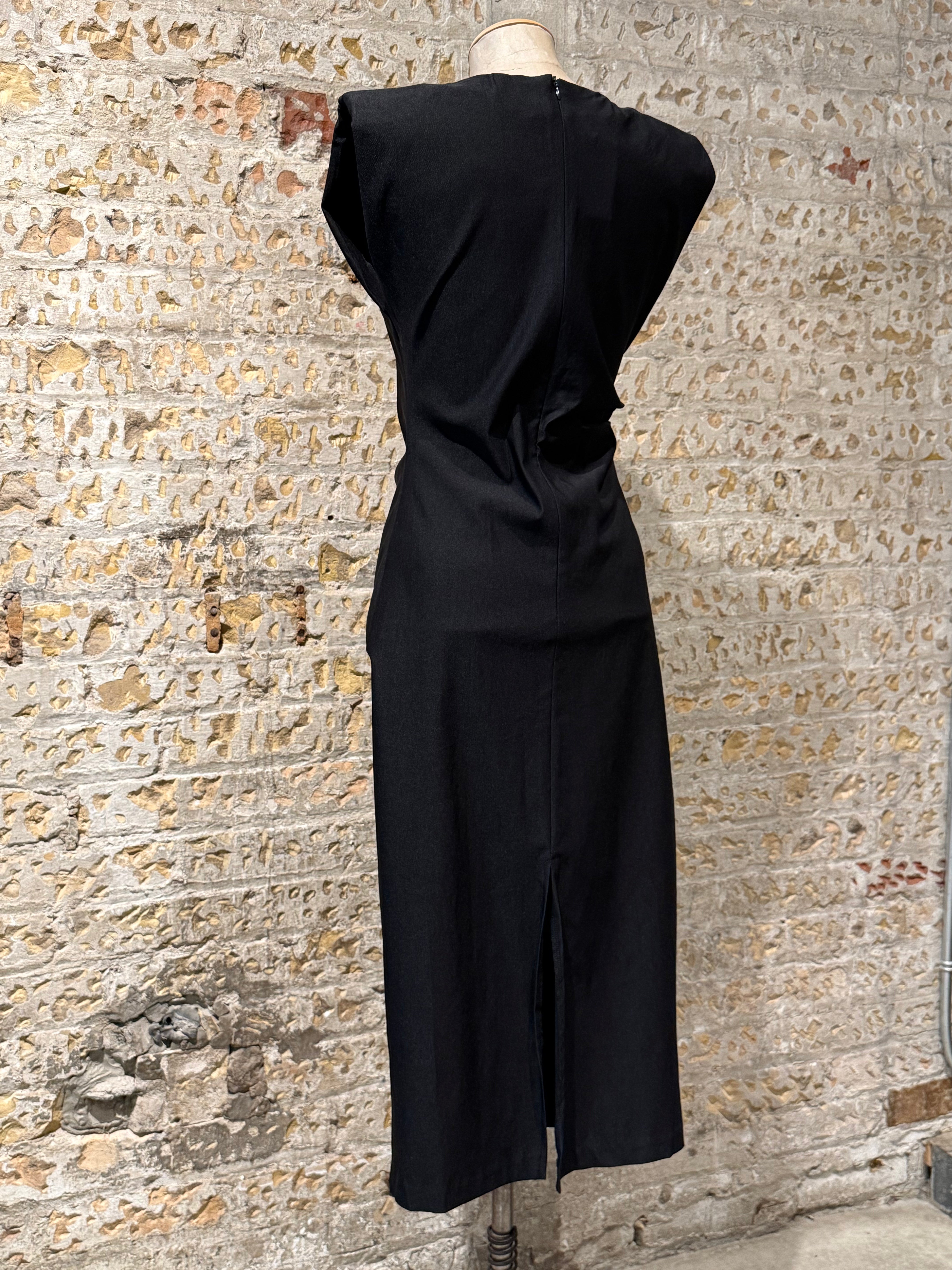 Black dress with shoulder pads